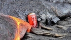 Coke Cans Being Smothered By Flowing Lava Is Oddly Mesmerizing